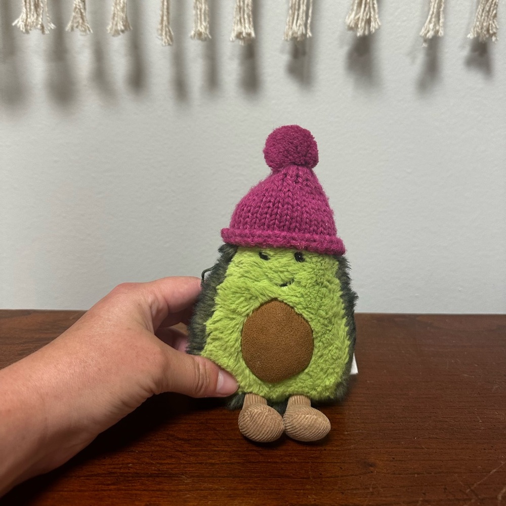 Jellycat avocado with purple snow hat